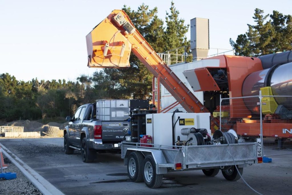 Photo of Pure Pressure ute, towing equipment on a trailer